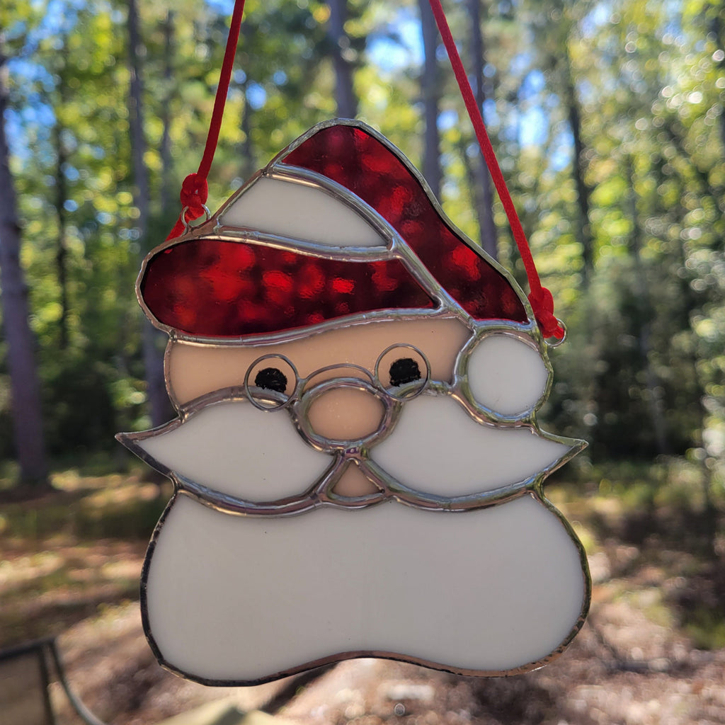 Beautifully crafted Stained Glass Santa Head Ornament - A Festive Touch for Your Holiday Decor