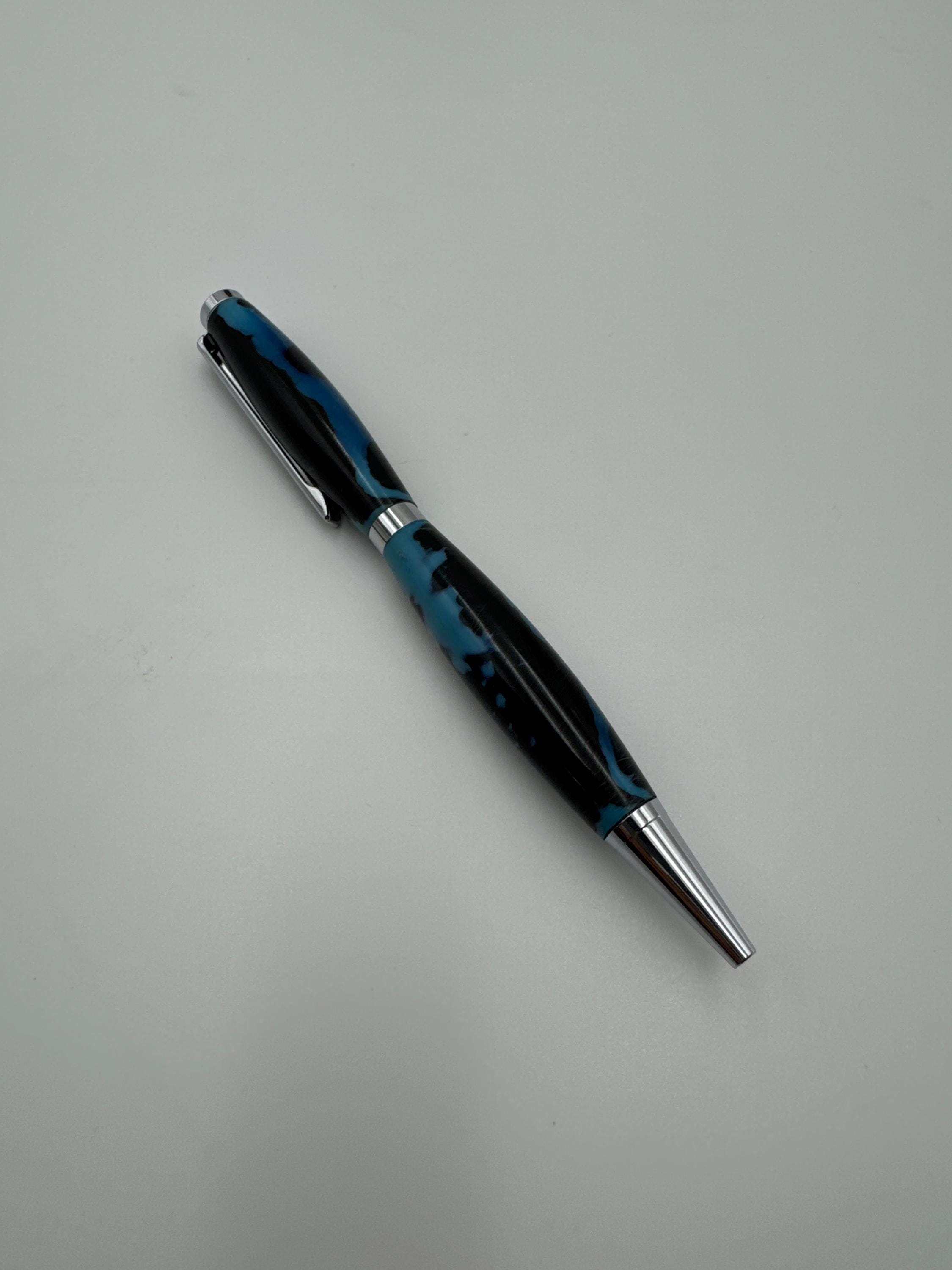 Hand-turned acrylic twist pen- "abused"