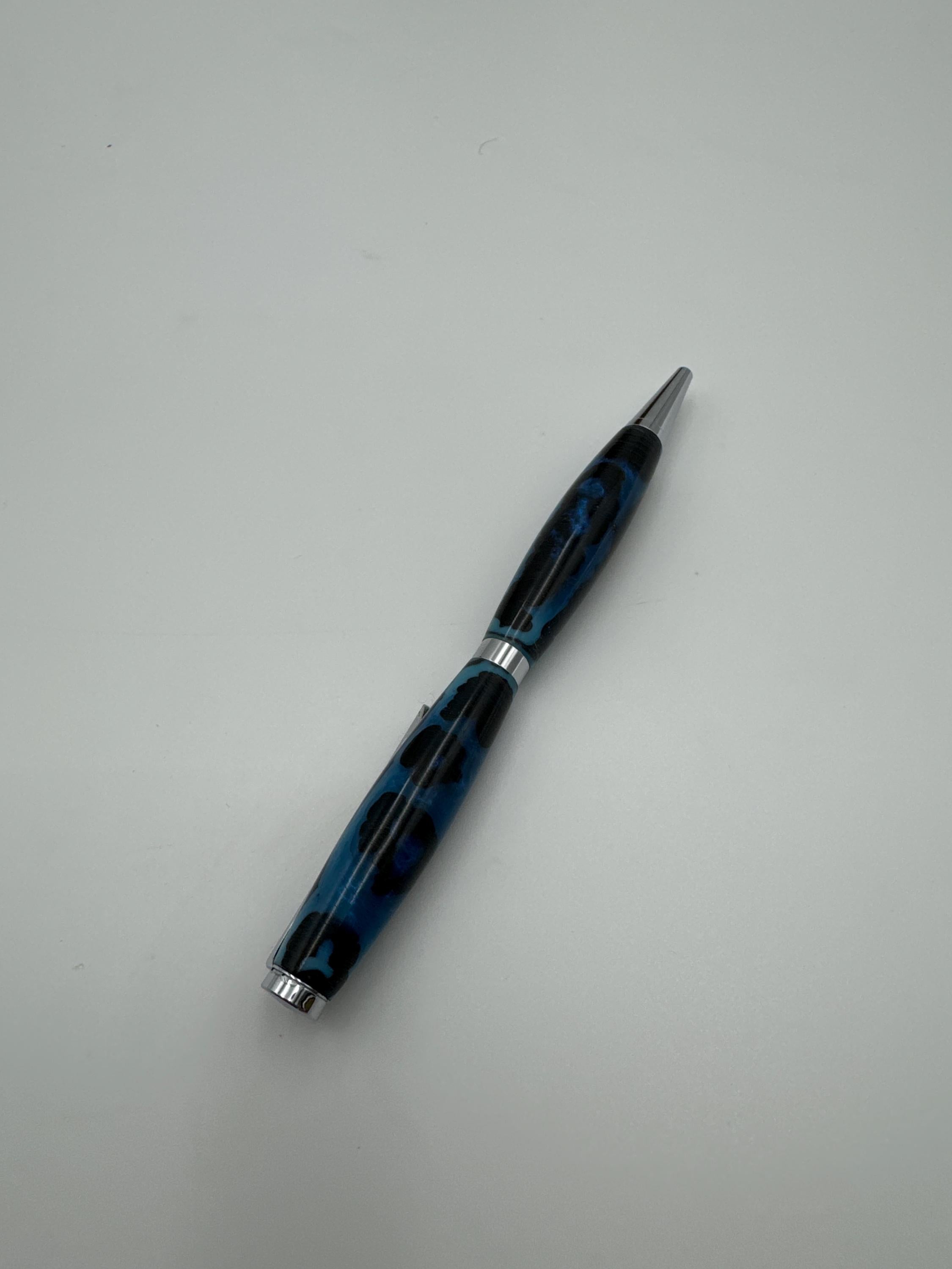 Hand-turned acrylic twist pen- "abused"