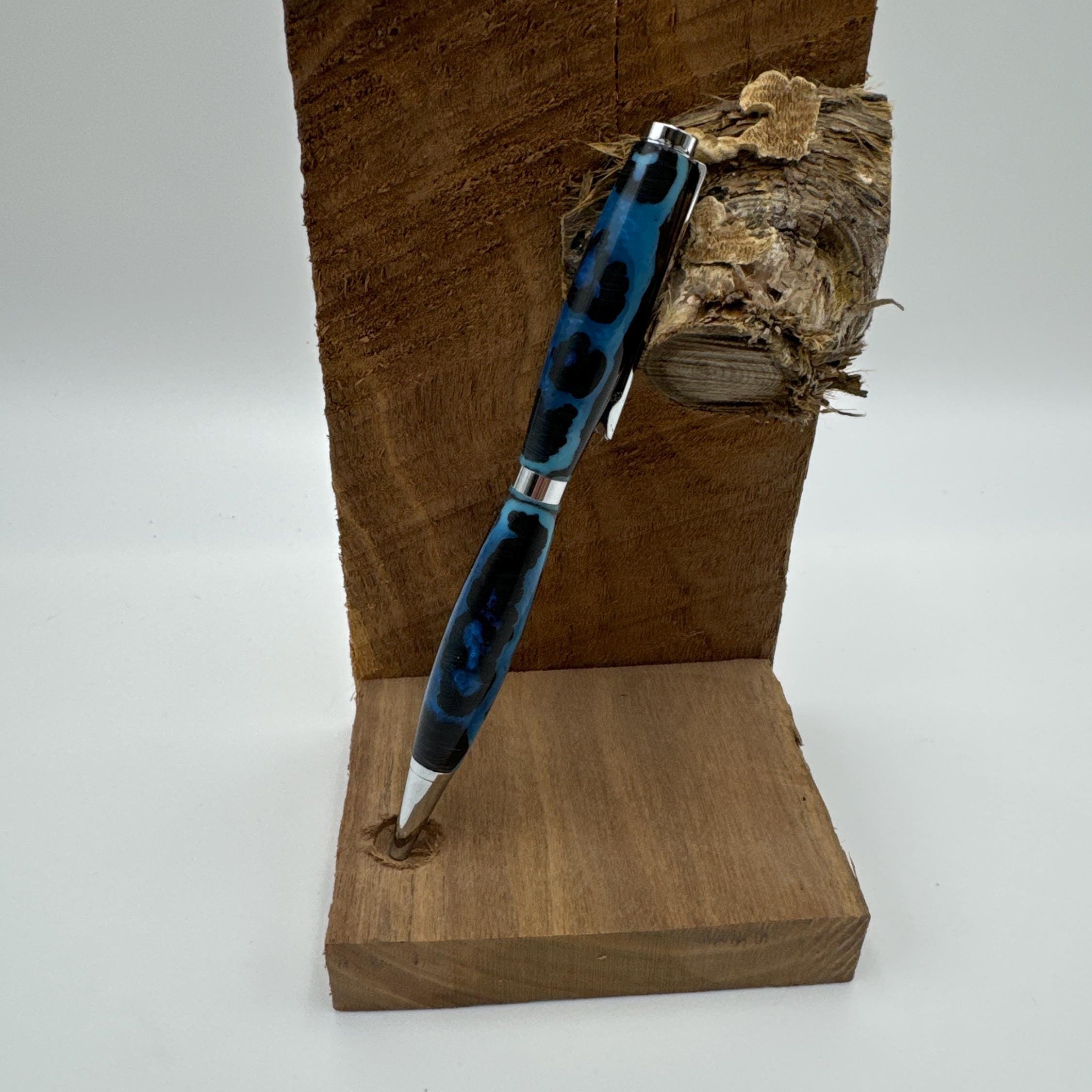 Hand-turned acrylic twist pen- "abused"